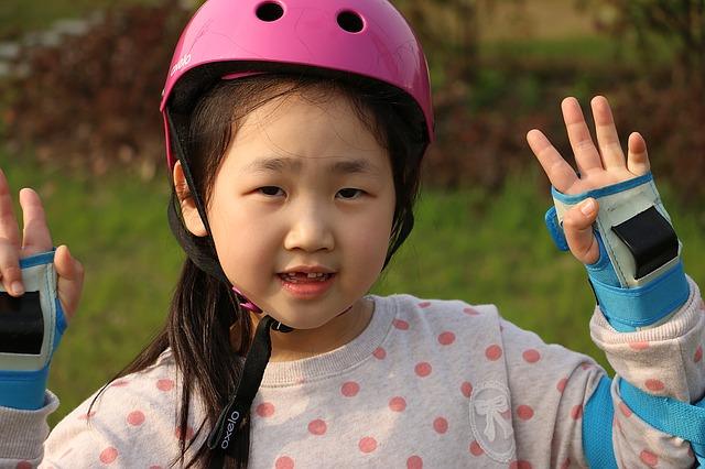 Child learns to roller skate