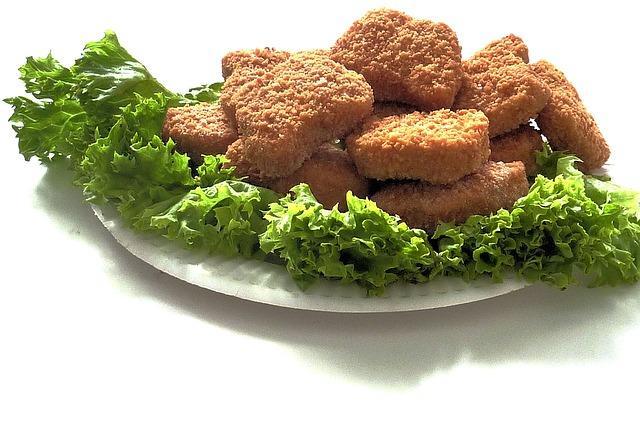 Chicken fillet in batter on a plate