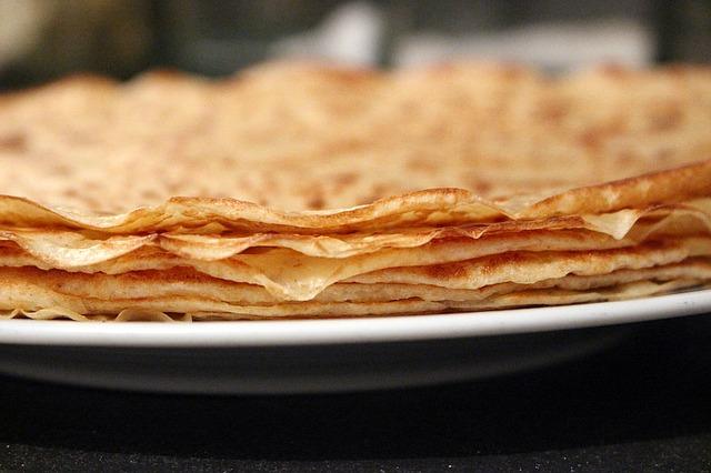 Beautiful stack of pancakes in milk