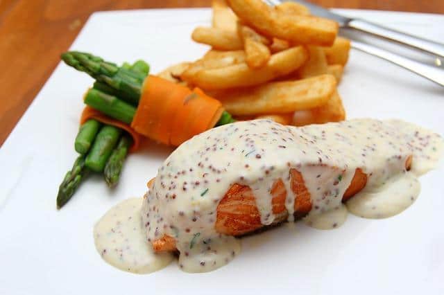 Red fish steak with cream sauce