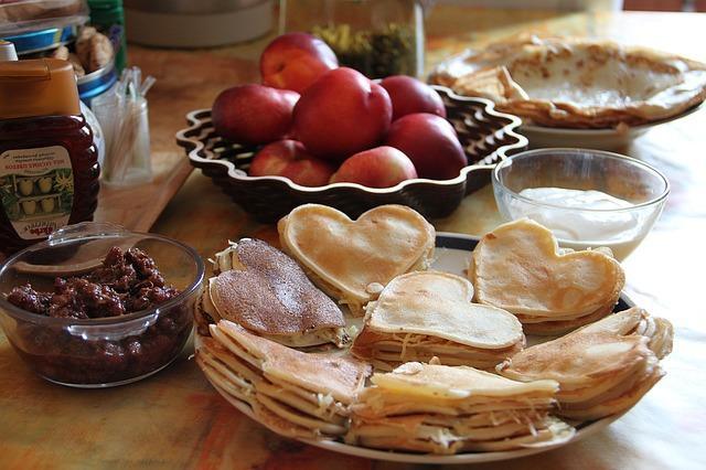 Delicious lace pancakes in the shape of hearts