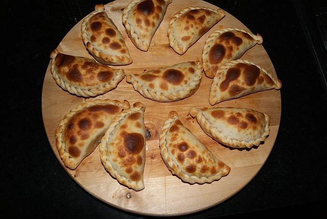 Juicy pasties on a blackboard