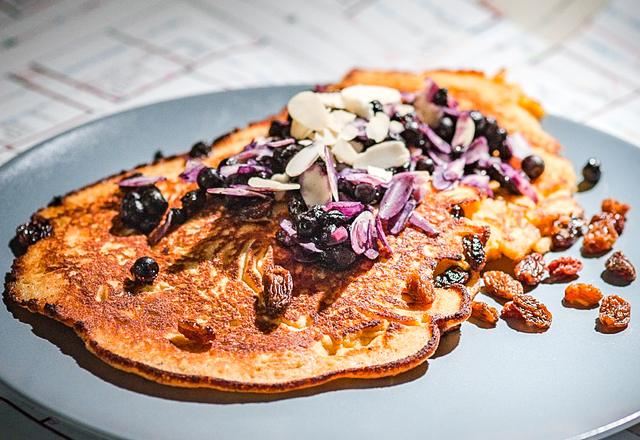 Pancakes on sour cream with dried fruits